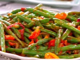 Warm Wax Bean Salad With Roasted Tomatoes And Sun Dried Tomato Dressing Recipe Tomato Salad Recipes Green Bean Recipes Trisha Yearwood Recipes