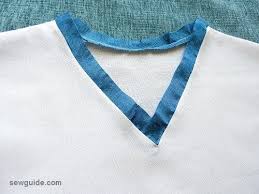 You'll start by prepping the v neckline on the front shirt piece. 6 Ways To Sew A V Neck In A Dress Top Sew Guide