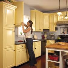 Instead Of Replacing Your Old Kitchen Cabinets Make Them New By Repainting Them With An Inexpensi Spray Paint Kitchen Cabinets Painting Kitchen Cabinets Home