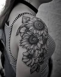 155 Sunflower Tattoos That Will Make You Glow Wild Tattoo Art 'small sunflowers' sticker by eeelzzza. 155 sunflower tattoos that will make