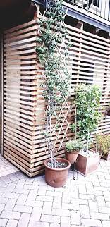 Learn how to use dividers to add privacy & structure to an open floor plan. Wood Shading Partition Patio Divider Ideas Partition Wall Wood Partition