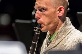 U.S. Marine Corps Staff Sgt. William Woosley, a clarinet