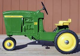 John deere pedal tractor, signed and numbered. John Deere Pedal Tractors