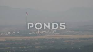 North korean soldiers walk past a propaganda painting in panmunjom. Glimpse Into North Korean Propaganda Vi Stock Video Pond5