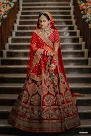 Glamorous Ludhiana Wedding With The Couple In Traditional Colours Indian Bridal Outfits Red Bridal Dress Wedding Lehenga Designs