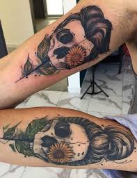 Hook tattoo with feather for couple. 26 Best Couple Tattoos That Will Make The World Say Relationshipgoals