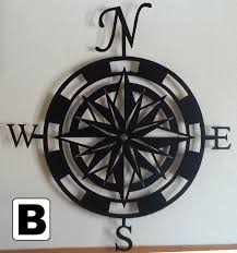 Making it an excellent choice for both indoor and outdoor wall sculptures. Black Compass Rose Metal Wall Art Shop Now At Iron Artz Com Metal Wall Art Compass Rose Compass Wall Art