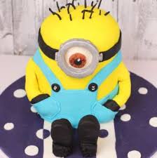 He was made with four layers of moist chocolate sponge cake. How To Make A Minion Cake My Kitchen Stories