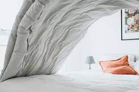 When you're done, release the soapy water from the bath, and then rinse the duvet in clean water. How To Wash A Comforter So It S Like New Again Lovetoknow