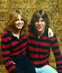 Where S Waldo Kids In High School Had These Same Shirts And Hair In The 1970 S Feathered Hairstyles My Childhood Memories Childhood Memories
