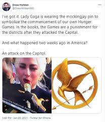 © bang showbiz lady gaga. Fans Compare Lady Gaga S Enormous Gold Brooch To The Hunger Games Mockingjay Pin Daily Mail Online