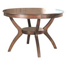 This 48 round turned leg dining table with (2) leaves is the perfect size for a family of four. Modern Classic 48 Inch Round Dining Table In Medium Walnut Wood Finish Q C Home