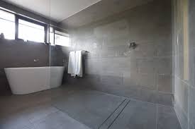 When you are remodeling and ready to design an easy to clean bathroom, create a wet zone for your shower. How To Make Your New Bathroom Easy To Clean By Design 5 Tips Ats Tiles Bathrooms