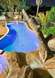 Tropical Pool Design Ideas Pictures Remodel And Decor Backyard Pool Cool Swimming Pools Backyard Pool Designs
