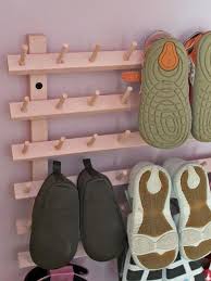You can make these shoe hangers out of old clothes hangers, which were originally made from wire. 33 Ingenious Ways To Store Your Shoes