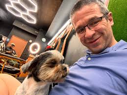 Just a dog at the barber shop watching out for his kiddos 🥰
