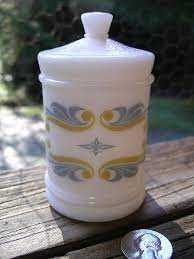 These vintage medicine bottles were made by machines, and they closed with a cork. Vintage Merck Apothecary Jar 1950 S Rediplete Vitamin Bottle Sharp And Dohme Lidded Milk Glass Container Apothecary Jars Milk Glass Jar