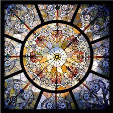 A steel frame that is configured into divisions or sections, and of course the beautiful stained glass panels. Stained Glass For Ceilings Domes