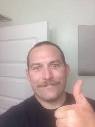 How many firemen does it take to cut one person's hair?