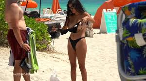 flashing her big tits at the beach with her husband waiting - XNXX.COM