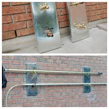Old And New Plumbing Parts Used As Hooks To Hang Our Pool Equipment The Boards Are Covered In Sheet Metal Pool Equipment Wall Lights Sheet Metal