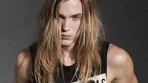 Messy And Long Blonde Hair On A Pale Young Man Seen In Close Up Dressed In A Black Tank Top With White Prin 90s Fashion Cocktail Attire Men 90s Fashion Men