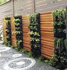 Just fill the tube with water and it's going to reach every flower because of the holes i was talking about at the beginning. 21 Vertical Gardens That Ll Give Life To Your Small Space