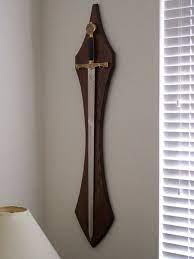 Maybe you would like to learn more about one of these? How To Make A Wall Hanging Sword Plaque Toolmonger Page 4 Sword Display Sword Display Cases Sword Hanger