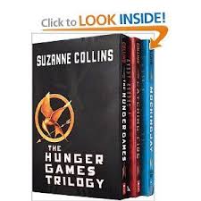 The Hunger Games Trilogy With Pin Hunger Games Catching Fire Mockingjay Hunger Games Hunger Games Trilogy Mockingjay