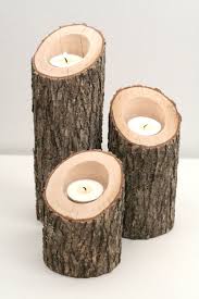 Wooden candle holders minimalist and modish at the same time, these rustic natural unfinished wooden candle holders are going to steal your guests' admiration with their whimsical woodsy charm and artistic contemporary construction. Tree Branch Candle Holders Set Of 3 Heights Angled Rustic Wood Candle Holders Tree Slice Wooden Rustic Wood Candle Holders Wood Candle Holders Wood Candles