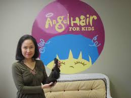 She donated 12 inches to angel hair for kids! St Francis Canossian College Alumni Association Ontario Regina S Hair Donation To Angel Hair For Kids Program 2014