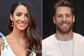 The entire world took notice of her incredible gy. Aly Raisman And Country Star Chase Rice Watch Bruins Playoff Win