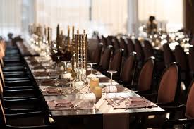 Enter a new restaurant theme: Premium Photo Long Table Dinner Party Fine Dining Reataurant