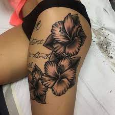 Black Hibiscus Tattoo On The Thigh Hibiscus Tattoo Flower Thigh Tattoos Thigh Tattoos Women