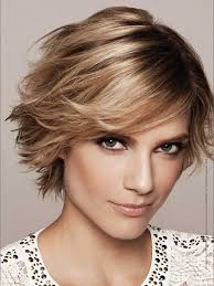 Her naturally thick hair creates body and volume in addition to the casual twists. 35 Cute Short Haircuts 2014