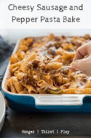 Cheesy Sausage And Peppers Pasta Bake Recipe Sausage And Peppers Pasta Stuffed Peppers Cheesy Pasta Recipes