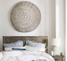 We've put together some tips and guidelines for displaying wall art in your home. Handwoven Willow Wheel Wall Art 48 In 2021 Carved Wood Wall Art Barn Wall Art Above Bed Decor