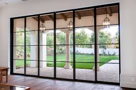Millworker house modern exterior home idea in toronto large sliding doors span floor to ceiling and move completely clear of the opening to create a seamless. Doors Steel French Patio Doors Single Patio Door Modern Sliding Glass Doors With Black Frame Big Modern Patio Doors Sliding Doors Exterior French Doors Patio