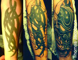 Many artists are great at coming up with a good tattoo cover up for names that will completely hide the old tattoo, even while using its linework in the new design. Tribal Cover Up Tattoo Tattoo By Thomas Jacobson Gallery 1010 1010 N Mills Ave 32803 Tribal Tattoo Cover Up Tribal Cover Up Cover Tattoo