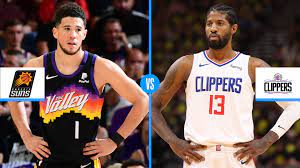 The clippers' reggie jackson, left, defends the suns' devin booker as he looks to pass during the second half of game 1 of the western conference finals on sunday afternoon in western conference finals schedule: 9tx9jx7dmzynrm