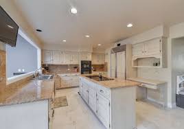 I have a pretty small kitchen (13' x 11') and at some point the area above the wall cabinets was boxed in, which is such a huge waste of space and make the kitchen look cramped. What Is A Kitchen Soffit And Can I Remove It Home Remodeling Contractors Sebring Design Build
