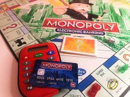 A few of the bills are a different color: Monopoly Electronic Banking Instructions Monopoly Land