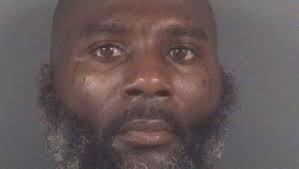 Fayetteville man charged in motel death