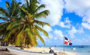 The flag of the dominican republic is the largest symbol of representation of the country, next to the national emblem and the national anthem have the category of national symbols, according to the. Dominican Republic Beach With National Flag Travel Off Path