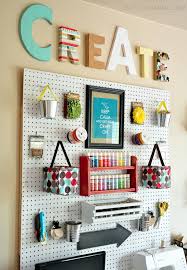 Use unusual fabrics and items to create unique textures and patterns for your paintings. Craft Room Wall With Whites And Brights