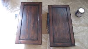This kitchen has a lot of wood in it, but because the cabinetry color is not a typical wood tone, there's enough variation to keep it from appearing. How To Stain A Cabinet With General Finishes Gel Stain Decorsauce Youtube