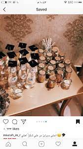 حلو نعطي للمويه شكل حلو بقبعات التخرج حسيتها تعطي جو وكيوتت graduation party decor graduation party planning graduation party backdrops