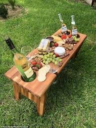 An Australian Father Has Created A Portable Grazing Table That Can Hold Your Wine Glasses And Beer Bottles While B In 2020 Wine Picnic Wine Picnic Table Grazing Tables