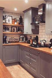 A solid stone surface will give a luxurious finishing touch to your kitchen while also having the advantage of being one of the most durable and hygienic surfaces available. With Chunky Solid Oak Worktops And Shelves To Match This Shaker Kitchen In Gullwing Matt Gives Off Cosy Kitchen Kitchen Inspiration Design Home Decor Kitchen