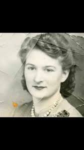 Can someone enhance this old photo of my mum?